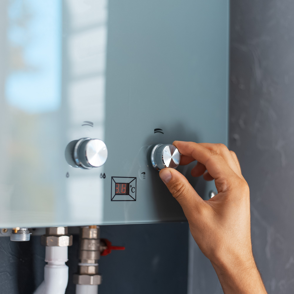 close up male hand adjusting temperature water heater modern home gas fired boiler