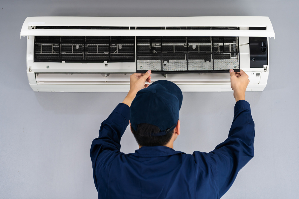HVAC Maintenance Checklist 1 technician service removing air filter air conditioner cleaning