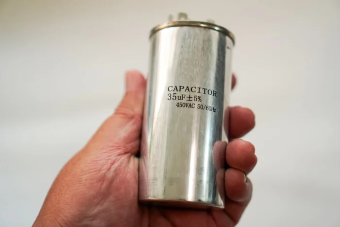 Cost to Replace a Capacitor on AC | Prices, Types & Saving Tips