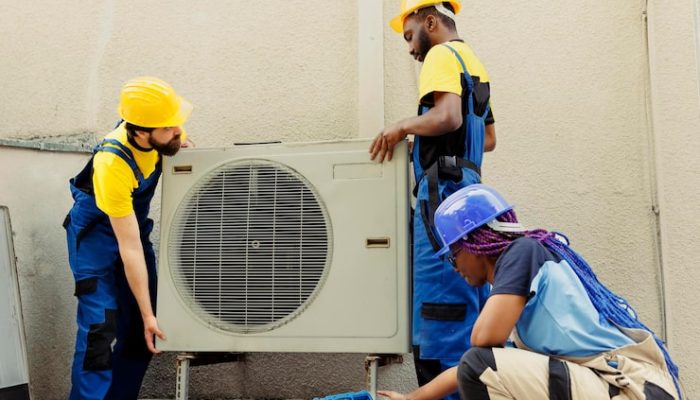 team-replacing-old-air-conditioner_482257-78499 (1)